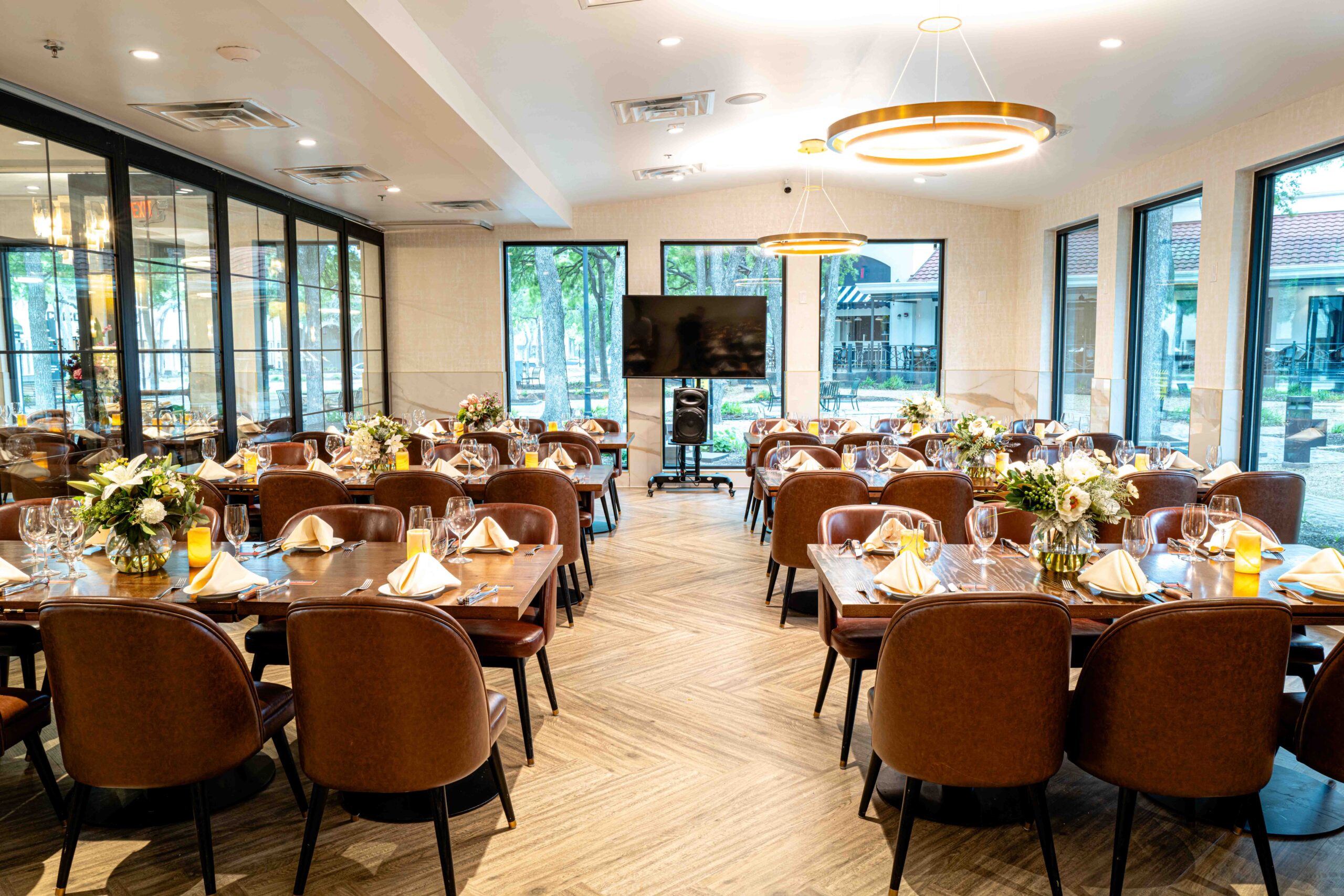 Private dining setup at Estância Brazilian Steakhouse in Austin with group enjoying dinner