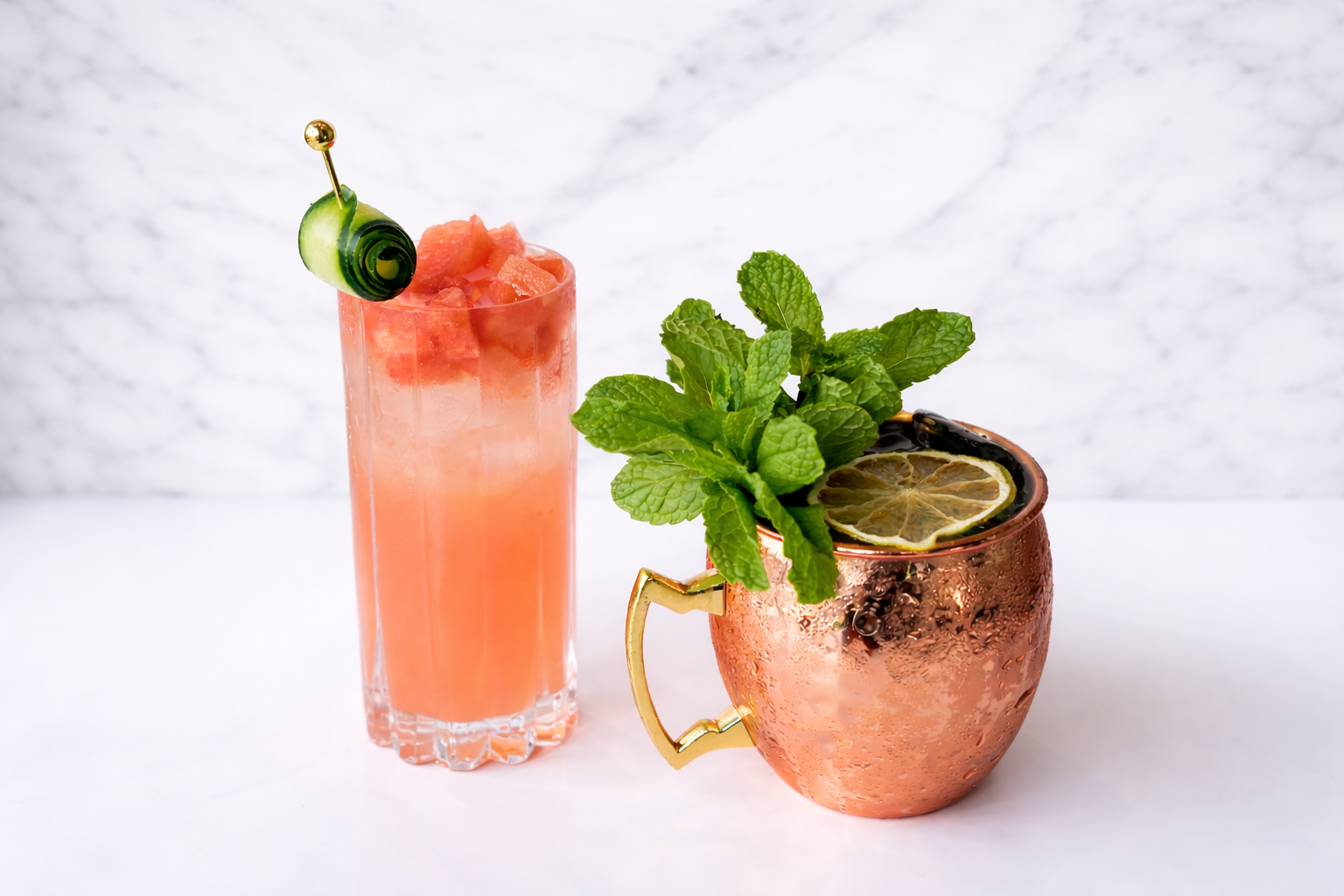 Signature cocktails served during happy hour in Austin and Leander featuring a fresh watermelon spritz and a mint Moscow mule.