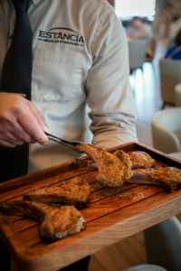 lamb chops served at Estância Brazilian Steakhouse for visitors looking where to eat during events in Austin and Leander