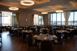 Family dining together at Estância Brazilian Steakhouse in Leander with tableside churrasco