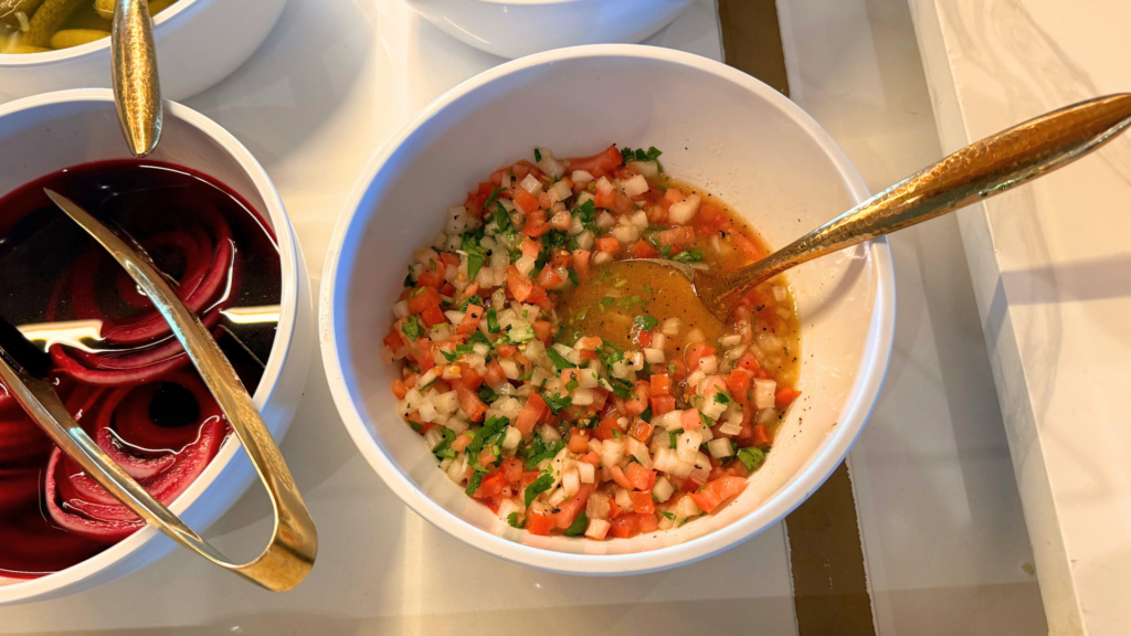 Brazilian vinaigrette with tomatoes, onions, peppers, and herbs served alongside churrasco