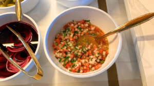 Brazilian vinaigrette with tomatoes, onions, peppers, and herbs served alongside churrasco